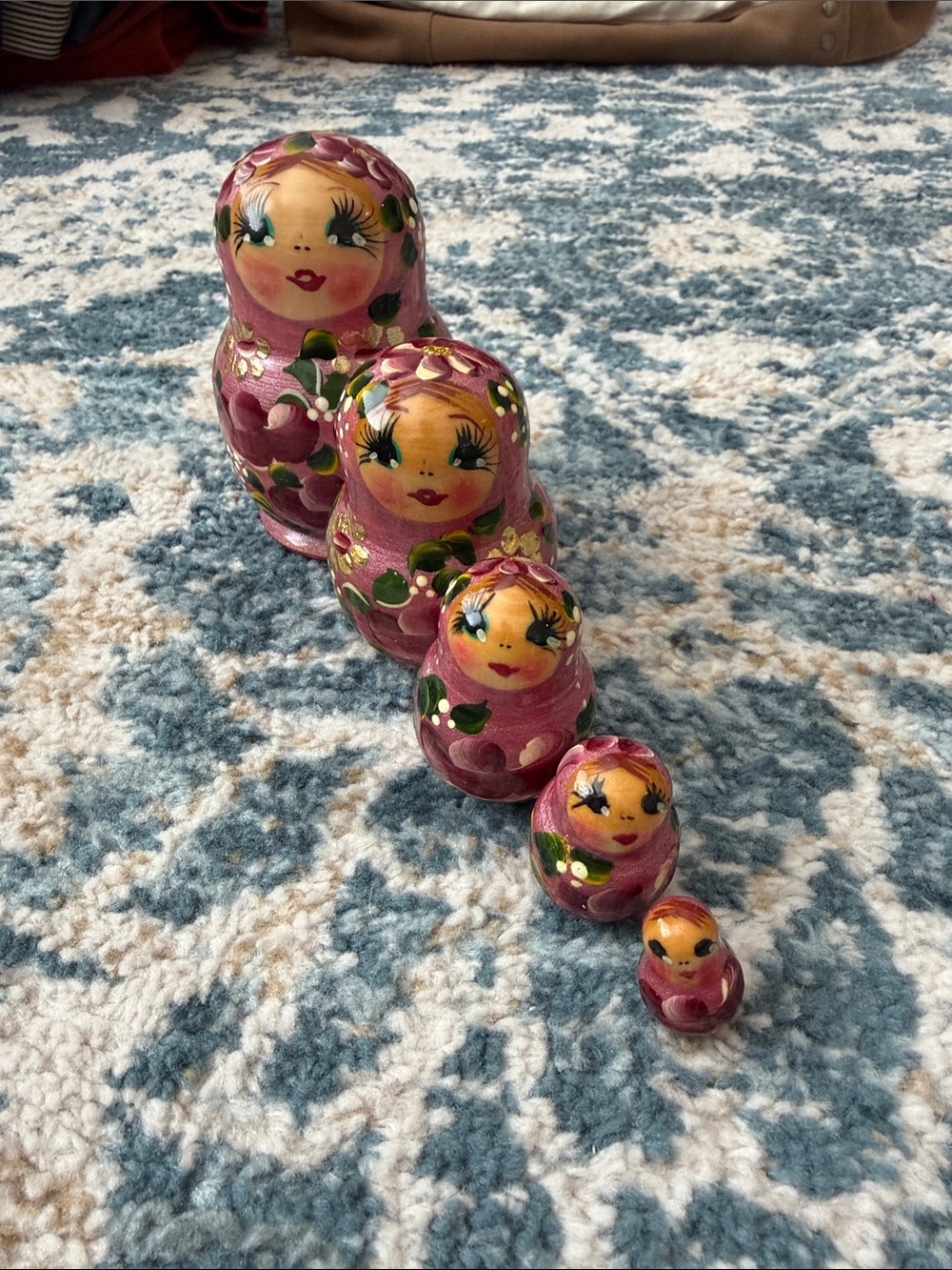 Source Unknown Shiny Pink Hand-Painted Nesting Doll with Green Accents